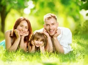 41023789 – happy joyful young family having fun in summer park