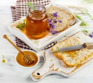 44443490 – honey and fresh toast for a breakfast.