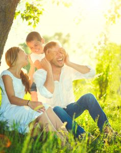 happy joyful young family having fun outdoors